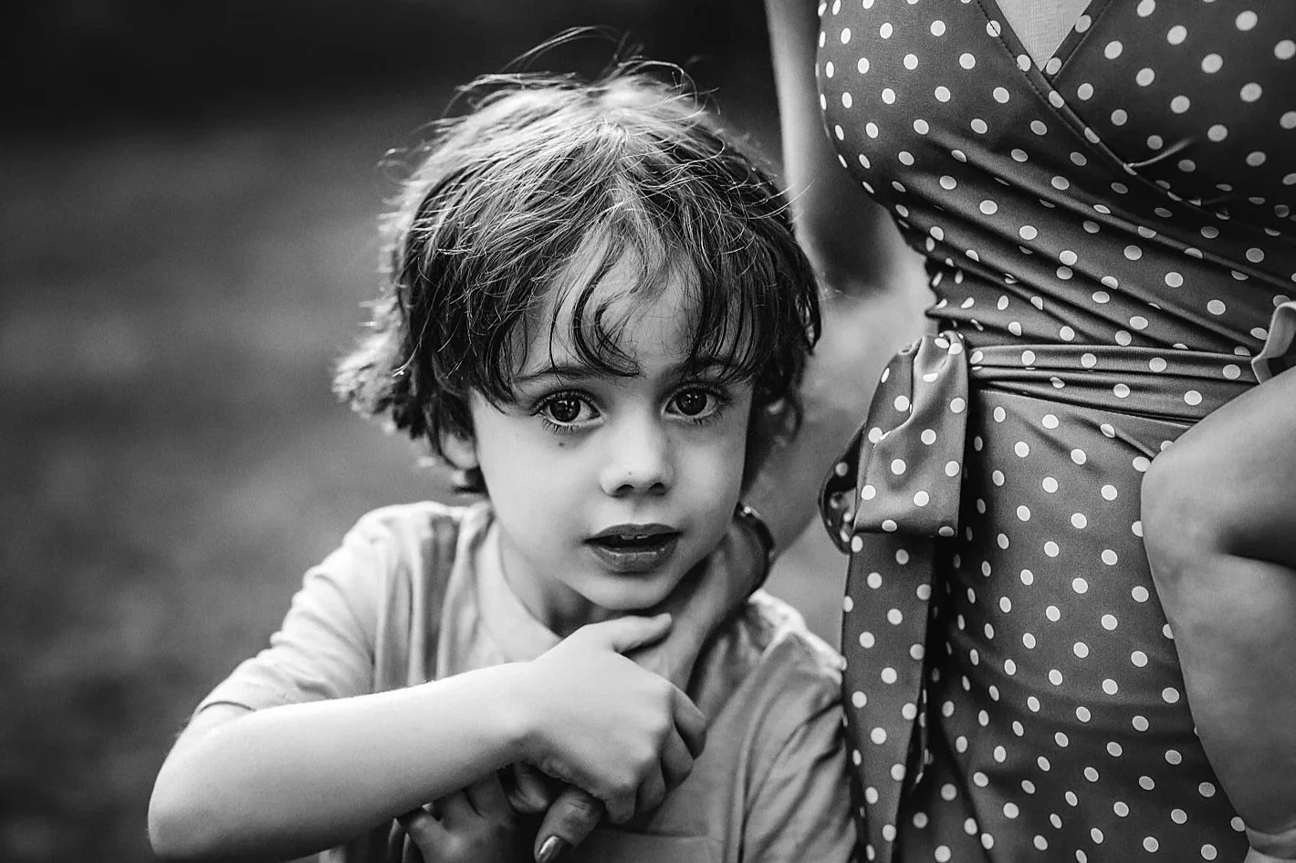 Close-up of hands holding in family portrait