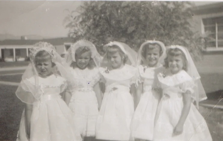 Monica far left, me to her right with other girlfriends at our First Communion in Tucson