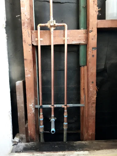 Oscar installed new copper pipe plumbing for a new bathtub