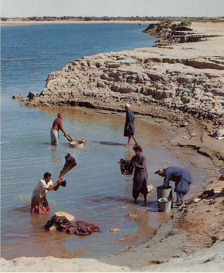 Fabric being washed in the river, Sindh. Source: Sindh Jo Ajrakh, Noorjehan Bilgrami