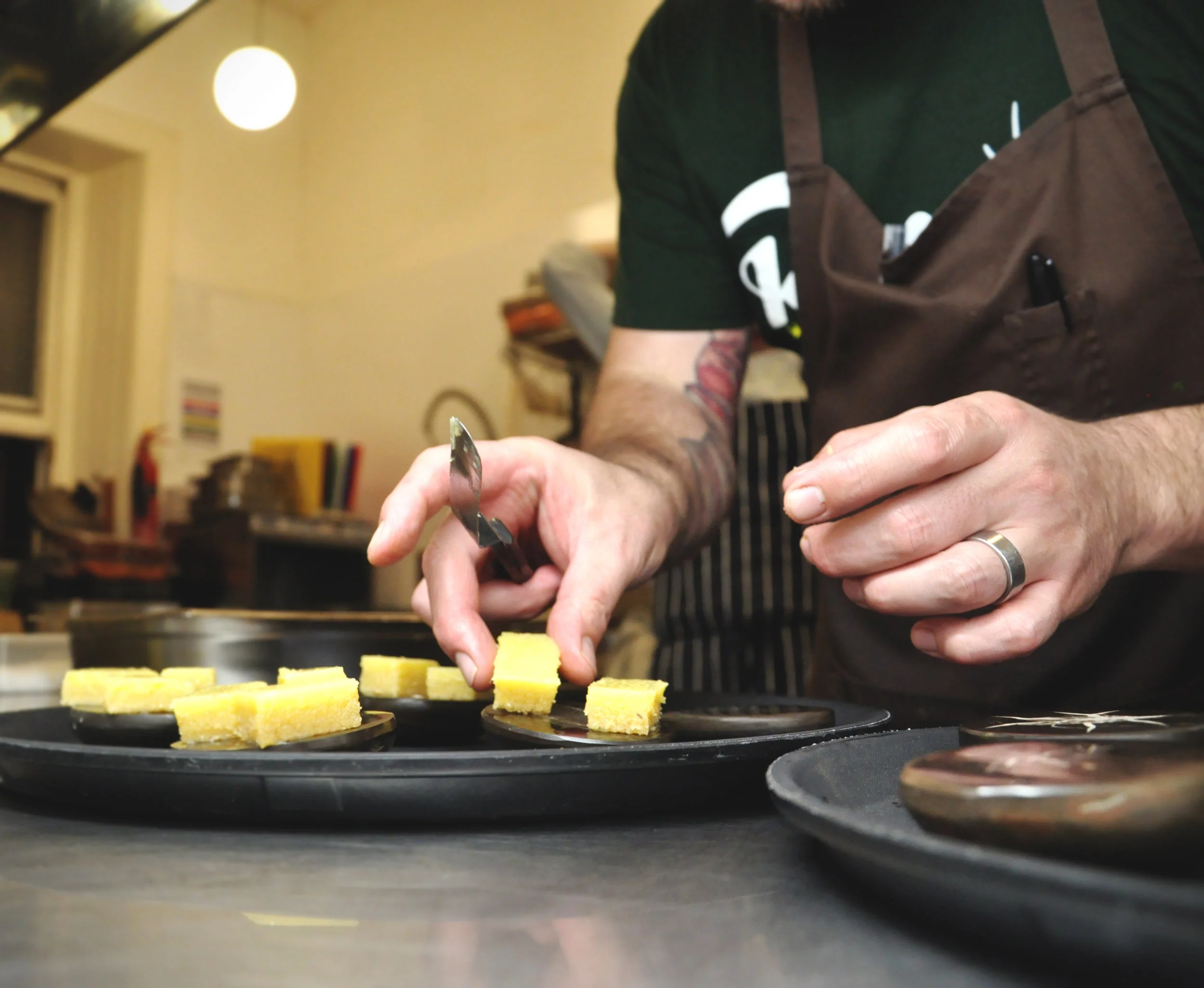 Leandro Carreira places petit-four on 330 million year old shark coprolite 'plates'