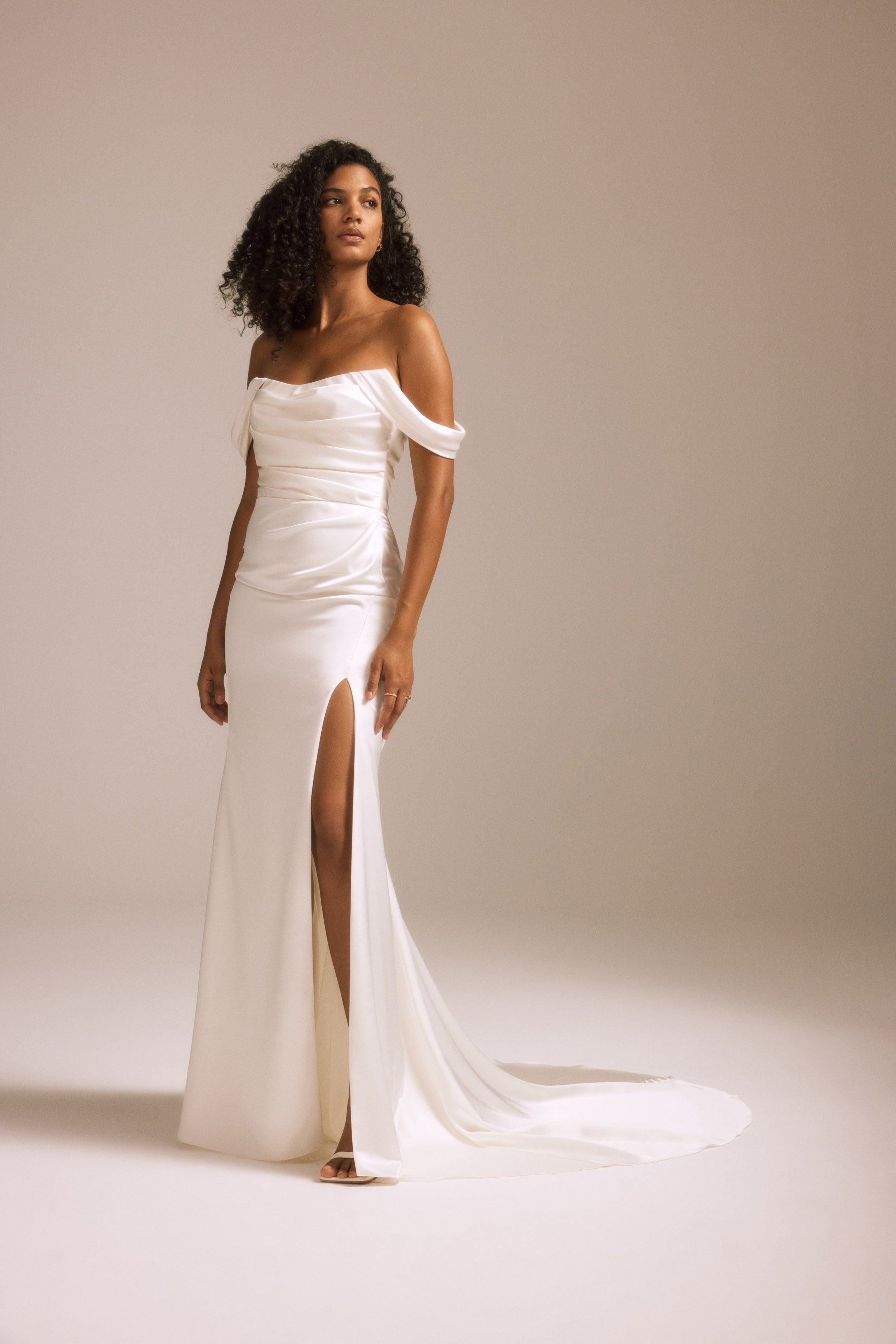 Nouvelle Amsale + Bridal + SYD + R453FS + Fluid Satin + Off-The-Shoulder + Fit-To-Flare Gown + Draped Skirt + Slit + Side.jpg