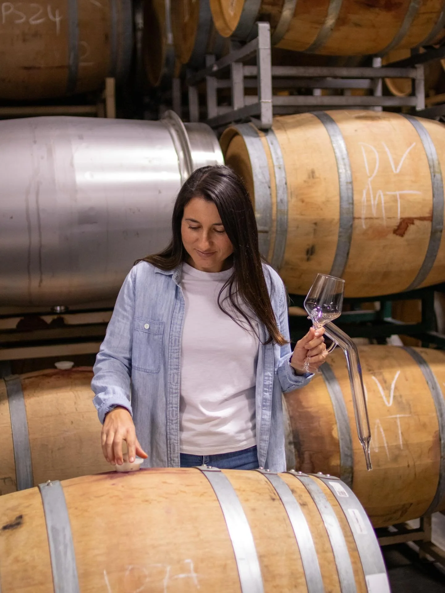 You know this is a staged photo because what winemaker wears white at the winery 😆 I was trying really hard not to get dirty. But that&rsquo;s not reality. The reality is sitting at my computer responding to emails, tasting trials in the lab, checki