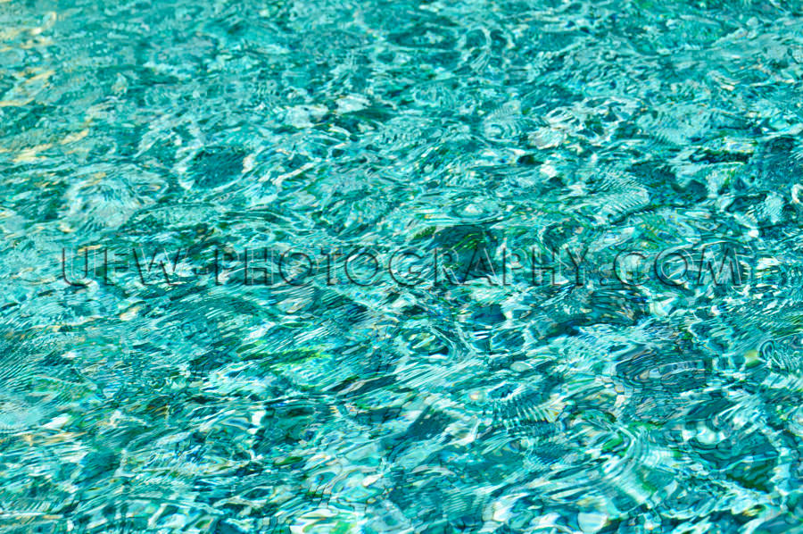 Turquoise abstract wavy water surface full frame background Stoc