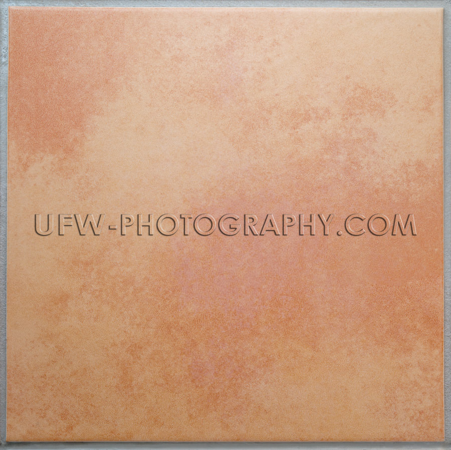 One apricot colored terracotta tile isolated background XL Stock
