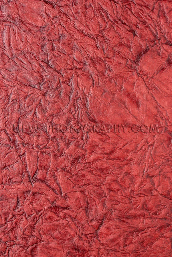 Dark red background wrinkled textured vertical grained Stock Ima