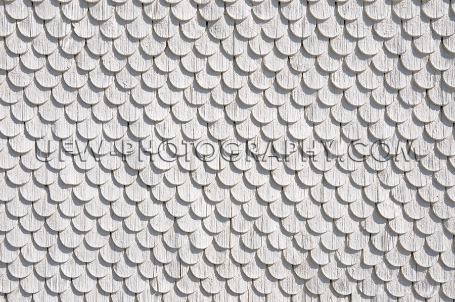Wood shingle wall circular pattern white gray background Stock I