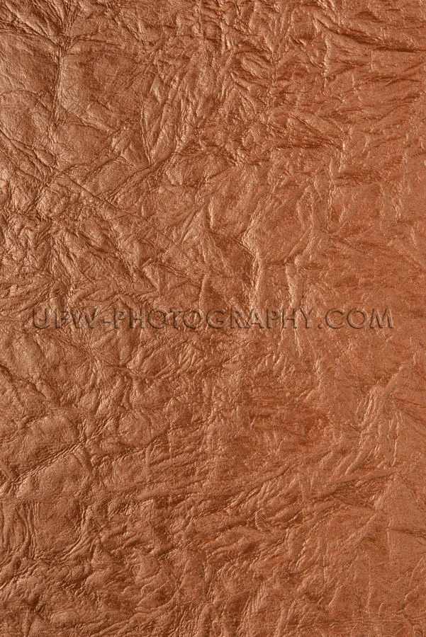Dark brown wrinkled texture structured background full frame XXX