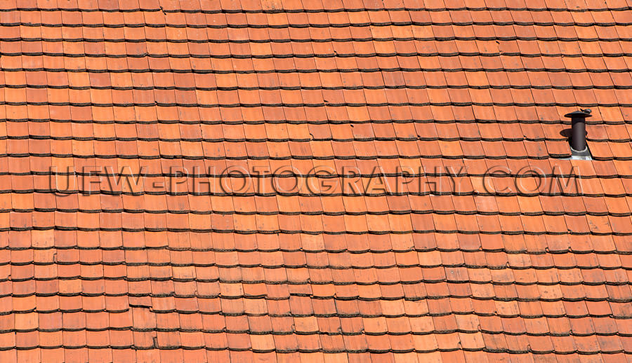Red shingled roof old house country full frame background Stock 