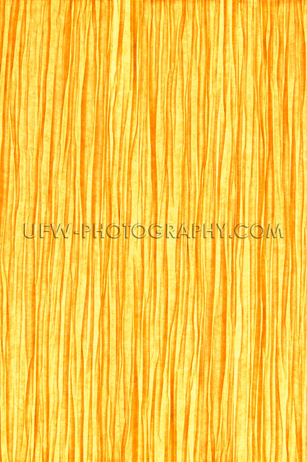 Paper texture backlit golden light wrinkled background Stock Ima