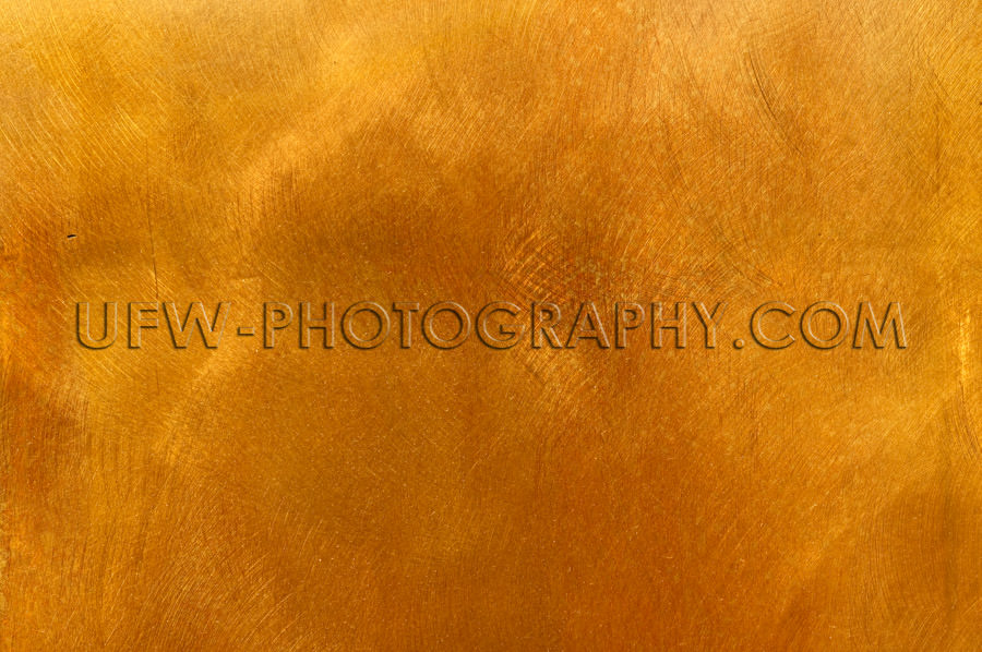 Abstract golden brass plate mottled texture for backgrounds Stoc