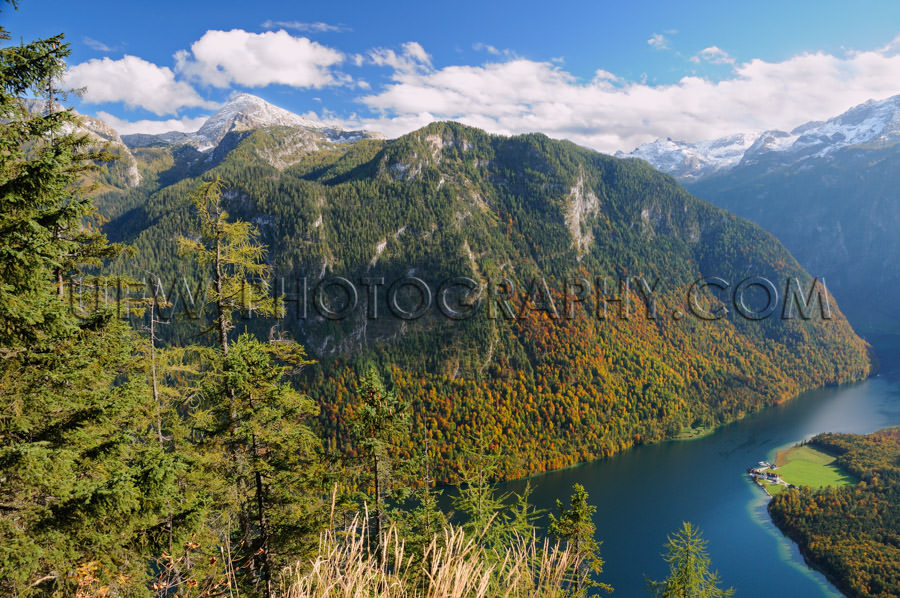 Awesome autumn mountain lake landscape blue cloudy sky Stock Ima