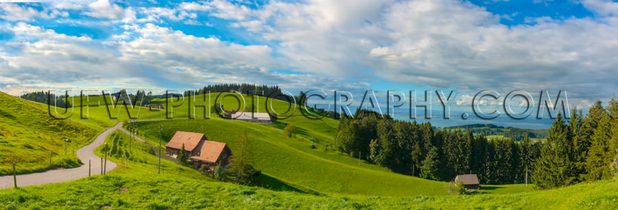 Awesome Swiss alpine mountain panorama meadows rolling hills Sto