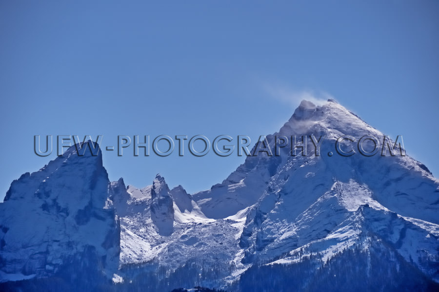 Beautiful snowcapped twin peak mountain against clear blue sky S