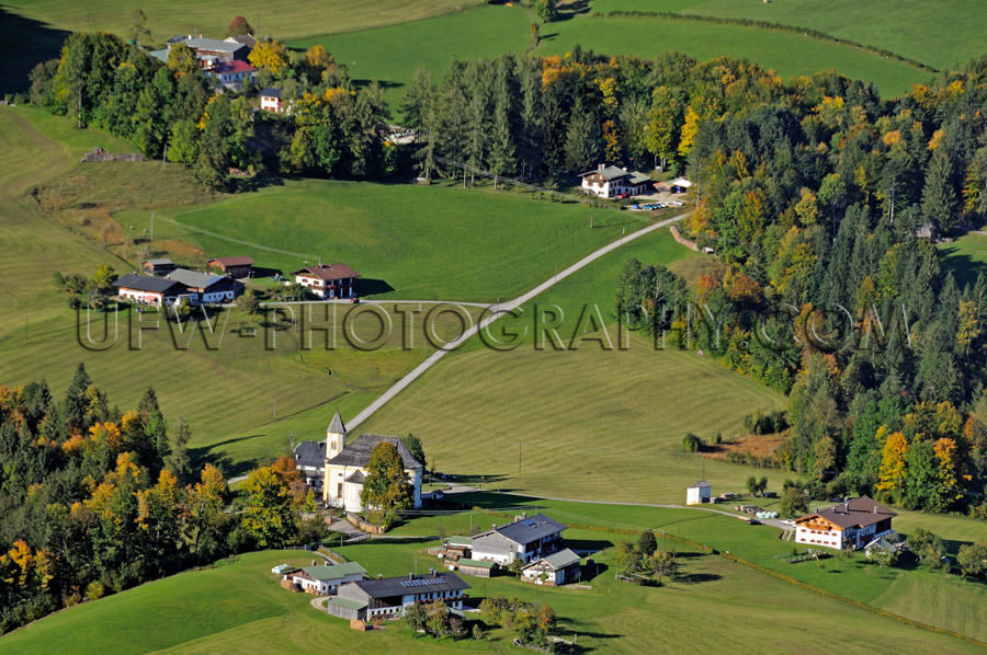 Lovely alpine countryside village dairy farms aerial view Stock 