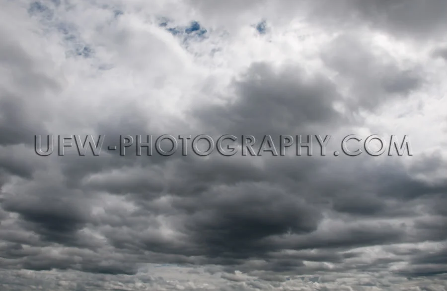 Dramatic ominous sky dark gray storm clouds Stock Image