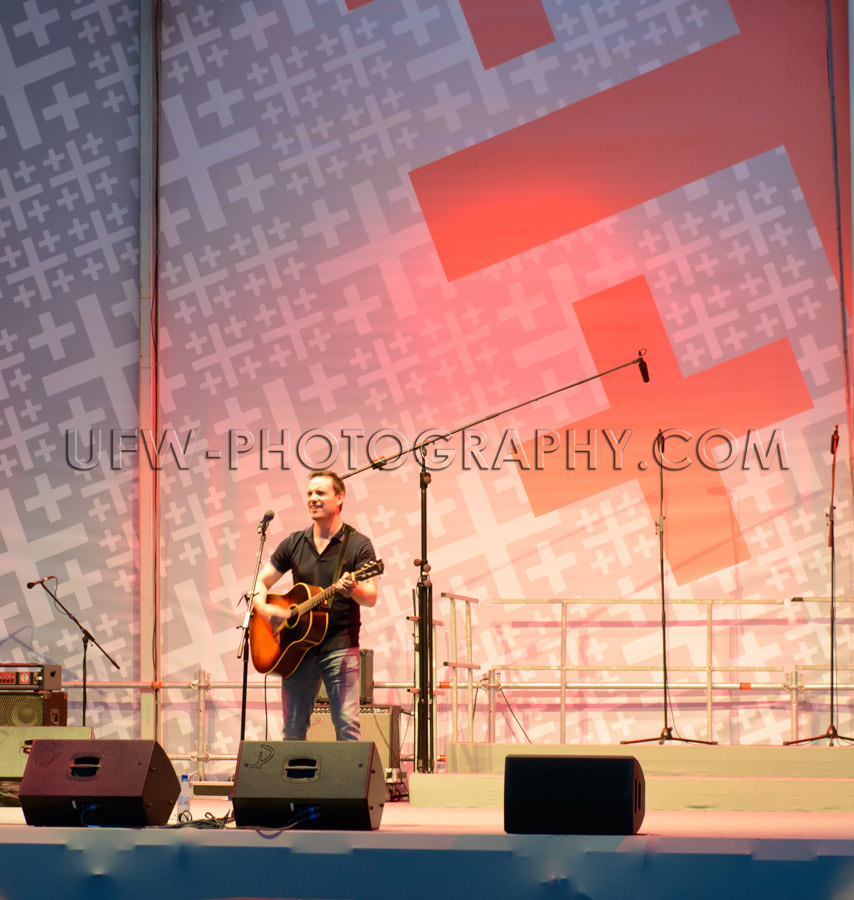 Concert musician singer stage guitar performance Stock Image