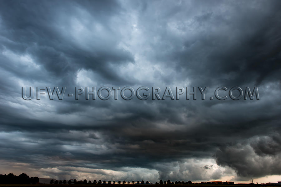 Stormy cloudy sky dramatic dangerous dark gray cloudscape Stock 