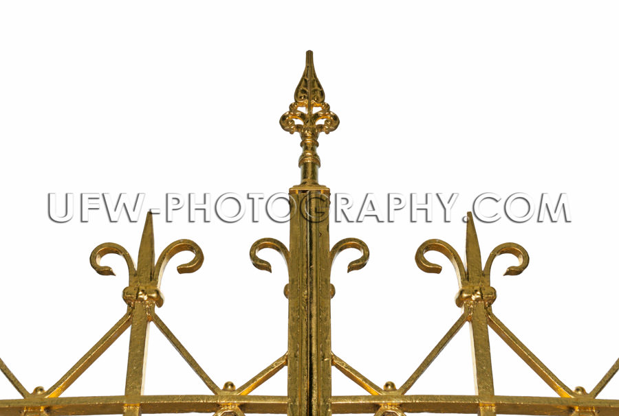 Top of golden ornamental iron gate Stock Image