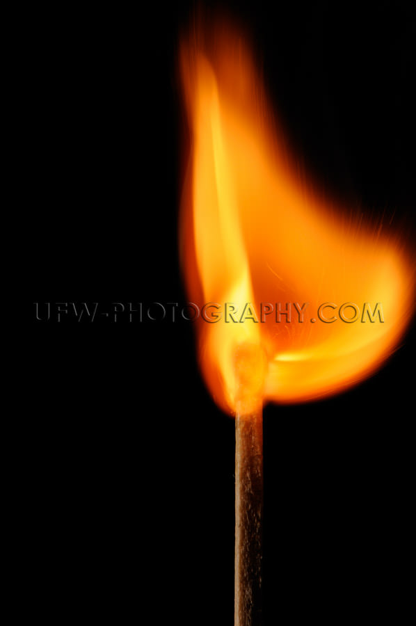 Burning matchstick creates beautifully bowl shaped flame Stock I