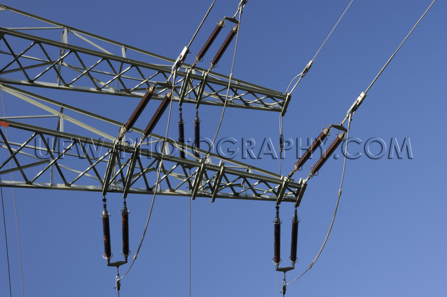 Electricity pylon arm insulator power line deep blue sky Stock I