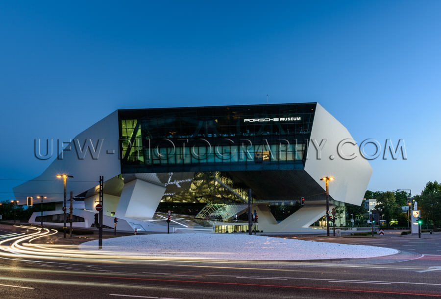 Futuristic architecture night traffic blur Porsche Museum Stock 