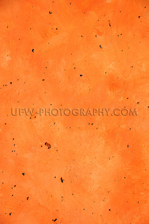 Abstract orange concrete wall brush painted background Stock Ima