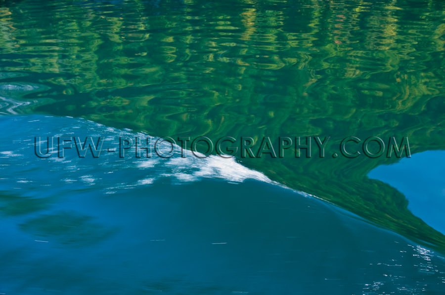 Bow wave of a ship, motion blur abstract pattern reflection- Sto