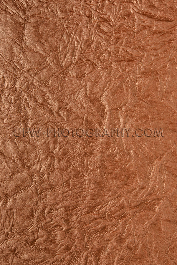 Dark brown wrinkled texture structured background full frame XXX