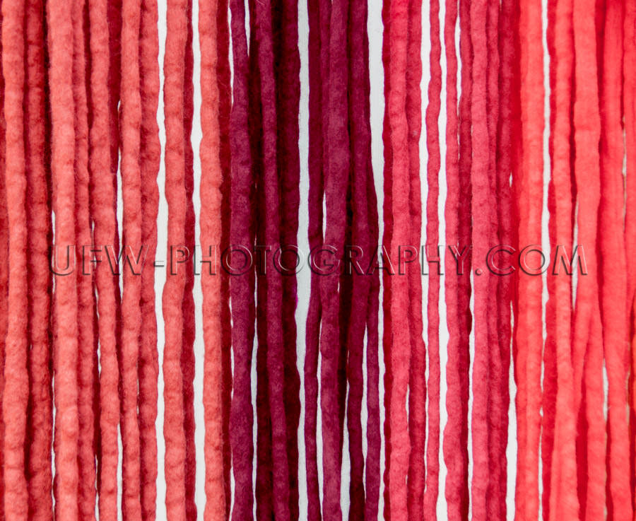 Felt ribbons shades of red hanging vivid color for backgrounds S