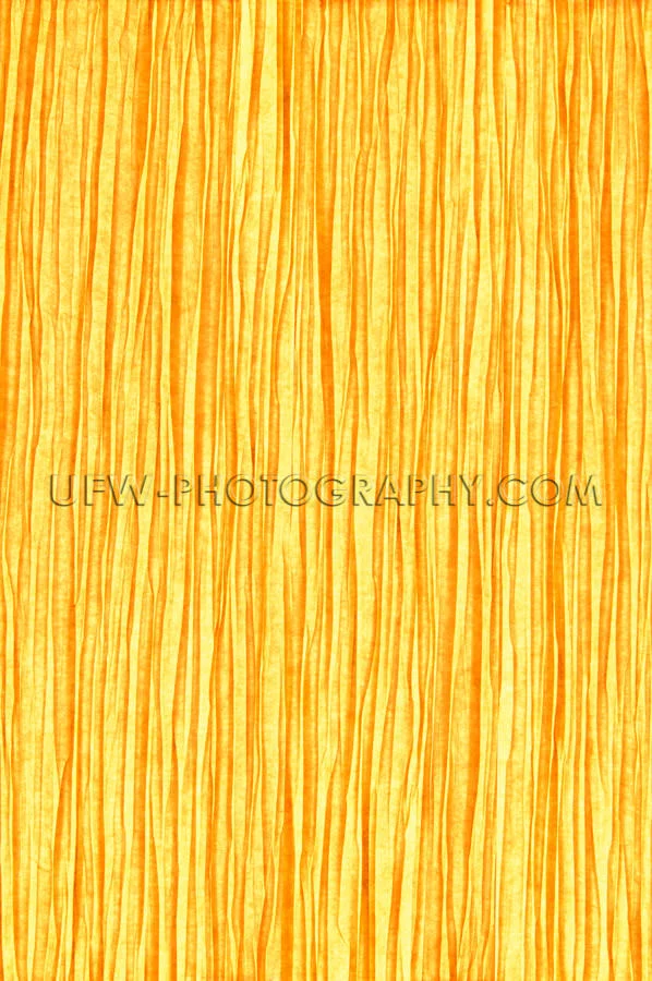 Paper texture backlit golden light wrinkled background Stock Ima