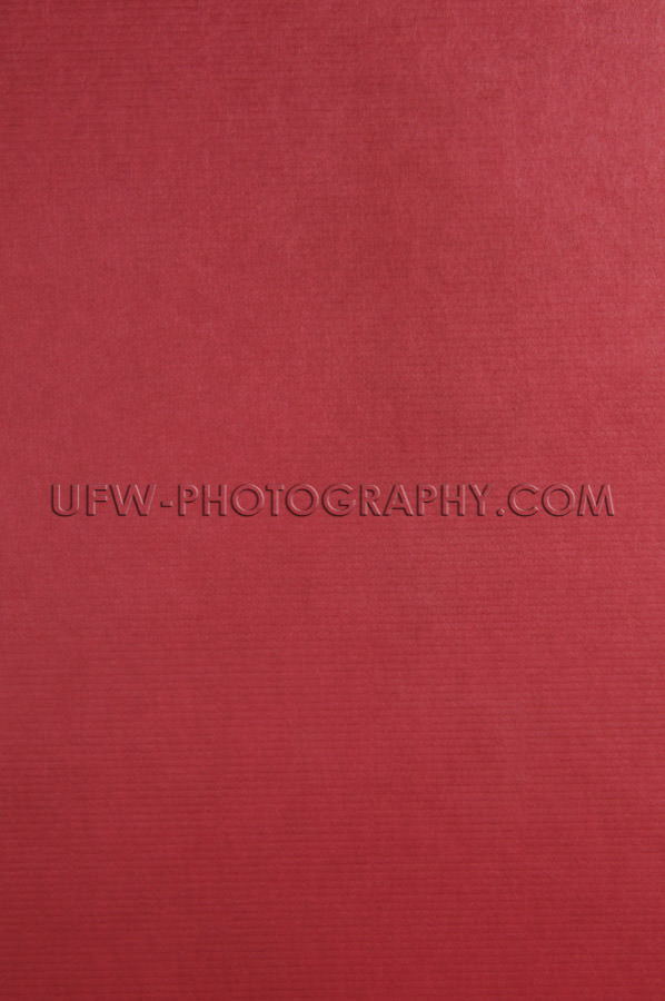 Red linen book cover evenly textured elegant ruby background Sto