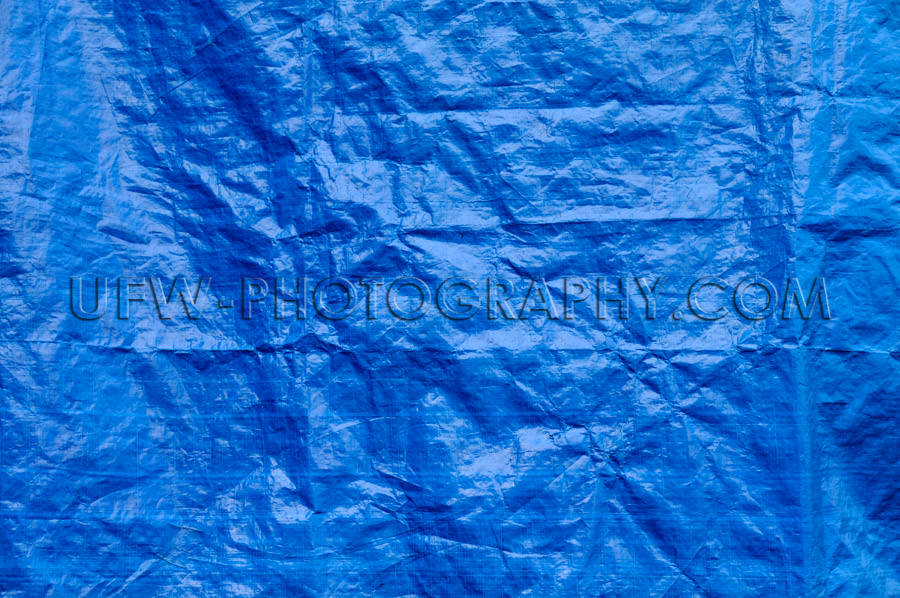 Wrinkled blue tarp texture full frame background Stock Image