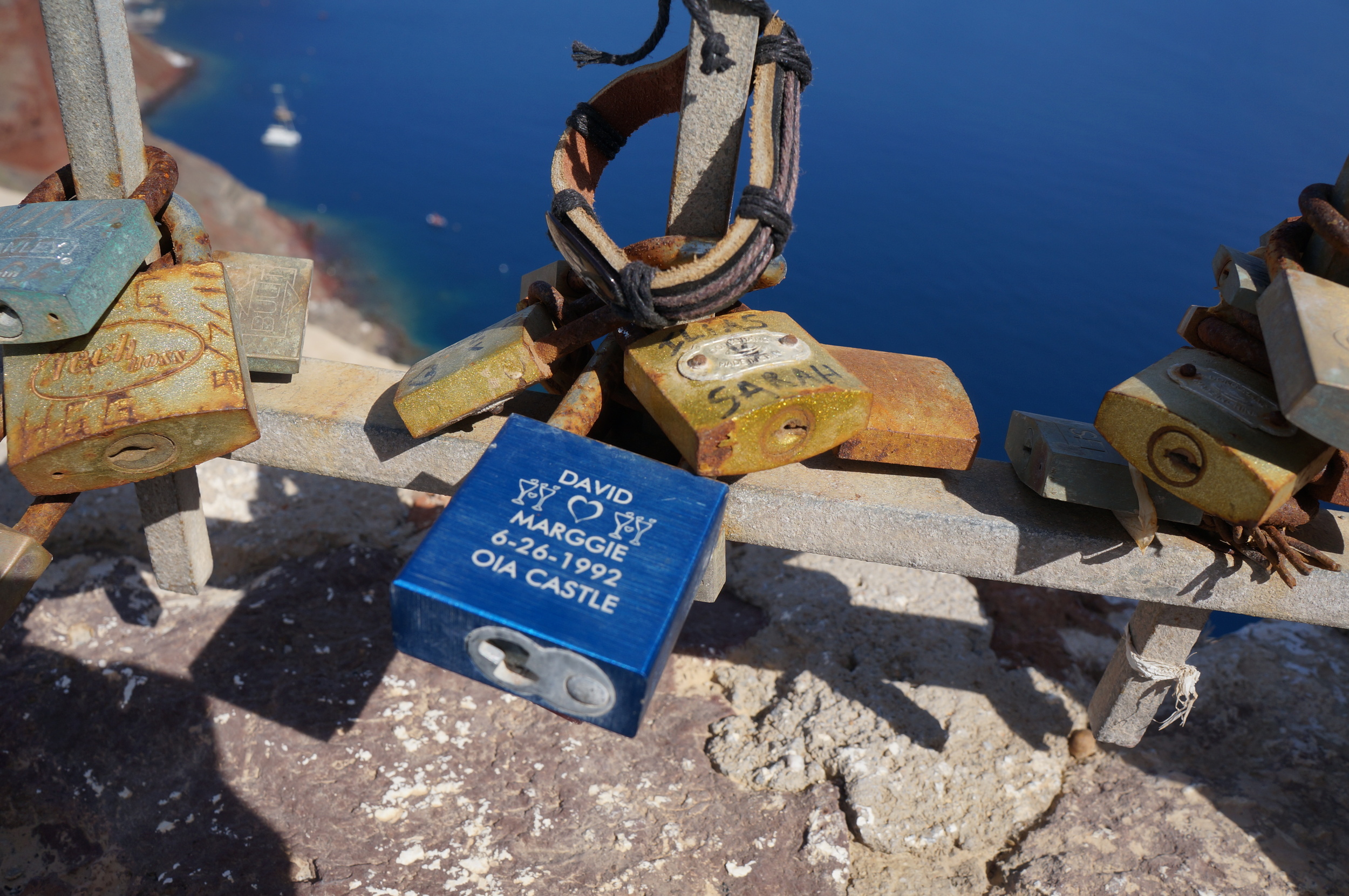Santorini has its own version of a love lock bridge - not a bridge but a gate located in an area of historic ruins. 