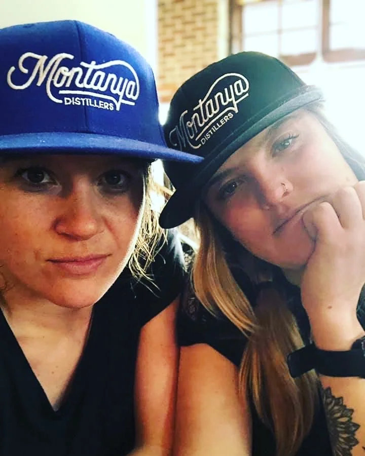 Polly (right) and Gina sporting Montanya Distillers hats.