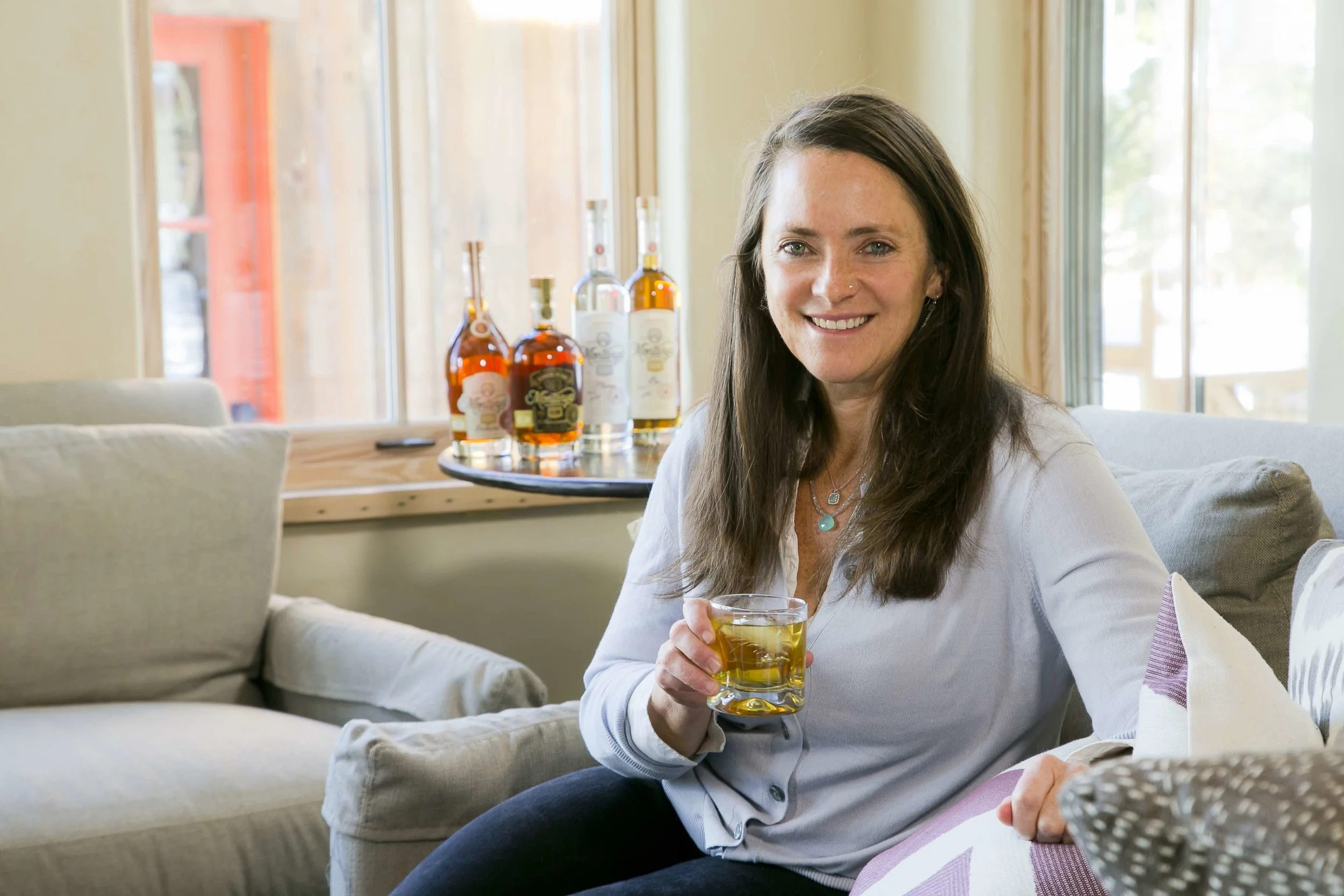 Founder and owner Karen Hoskin enjoying Montanya Oro.