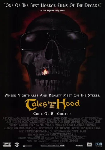 Tales from the Hood - Dir. Rusty Cundieff imdb synopsis: A funeral director tells four strange tales of horror with an African American focus to three drug dealers he traps in his place of business.
