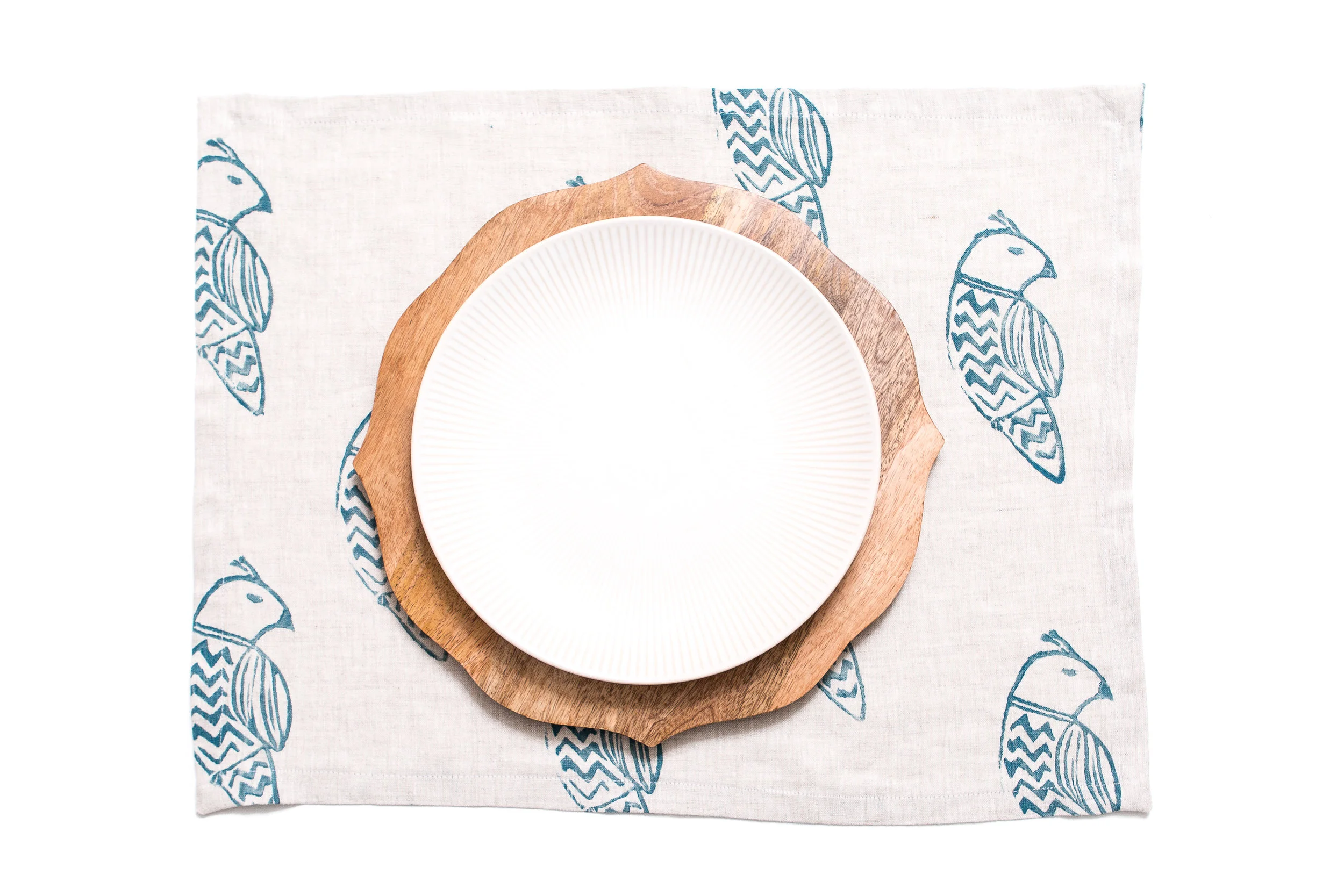 placemat chevron bird in peacock blue in oatmeal linen.jpg