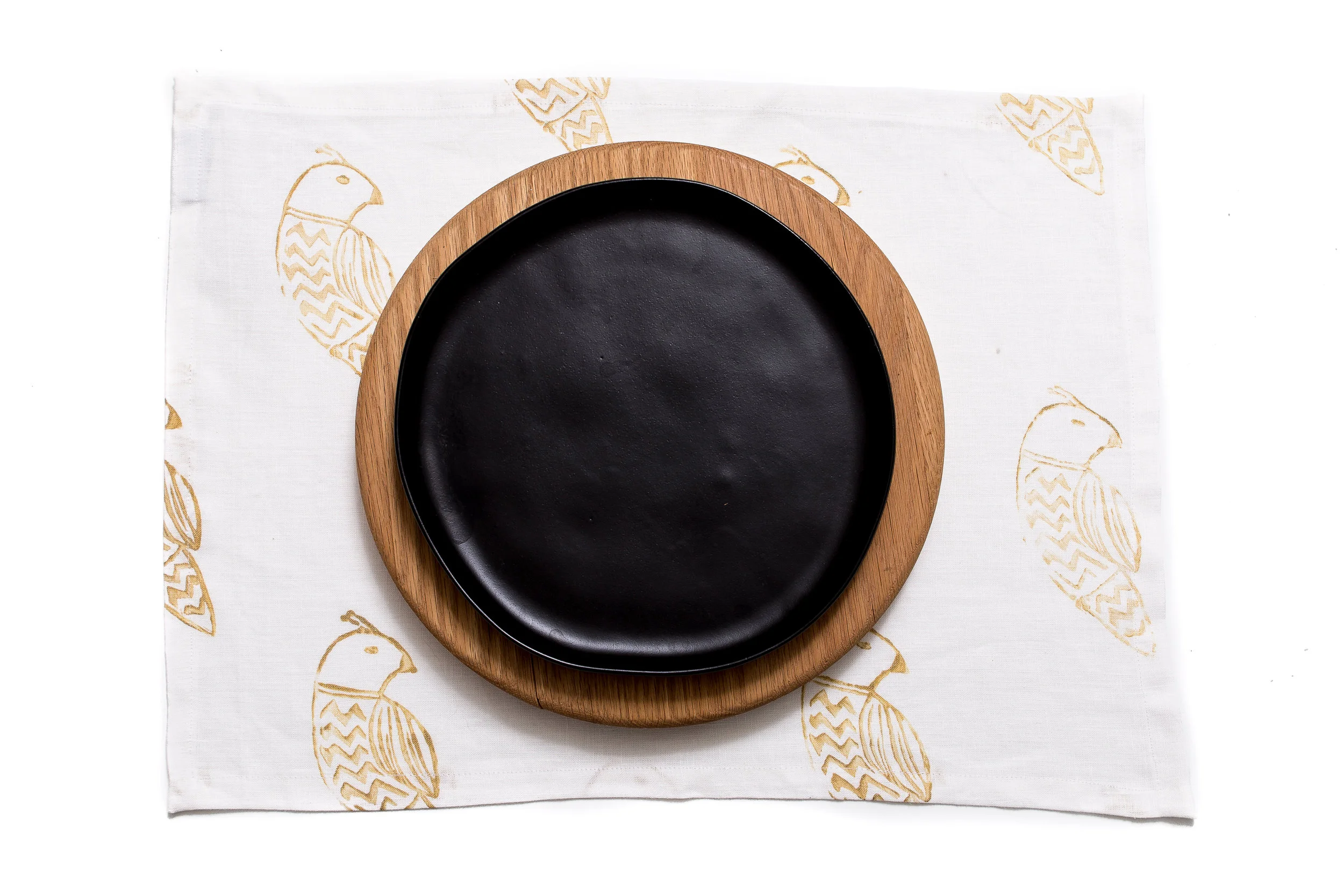 placemat chevron bird in gold on white linen.jpg