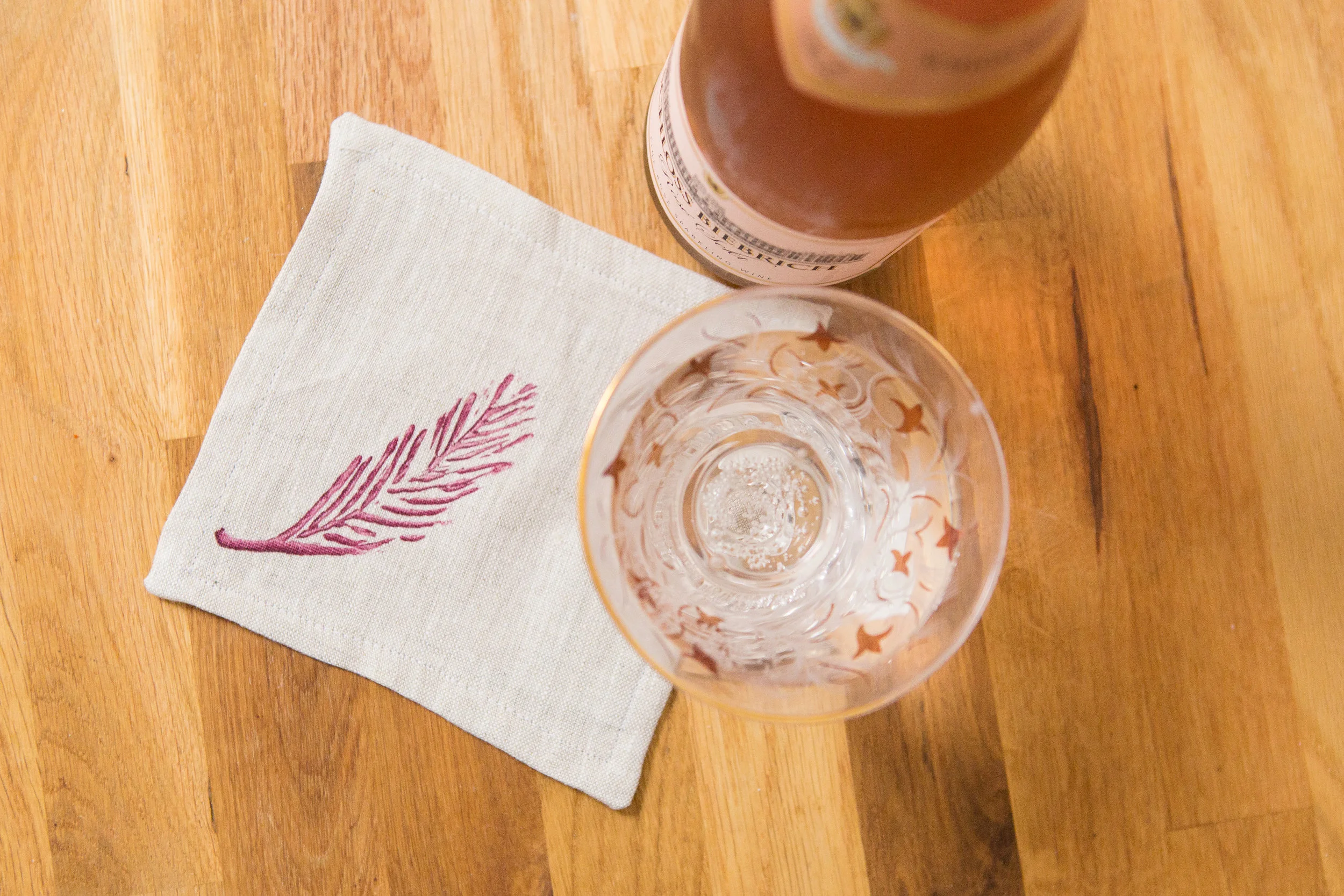 cocktail nap feather in brick on oatmeal.jpg