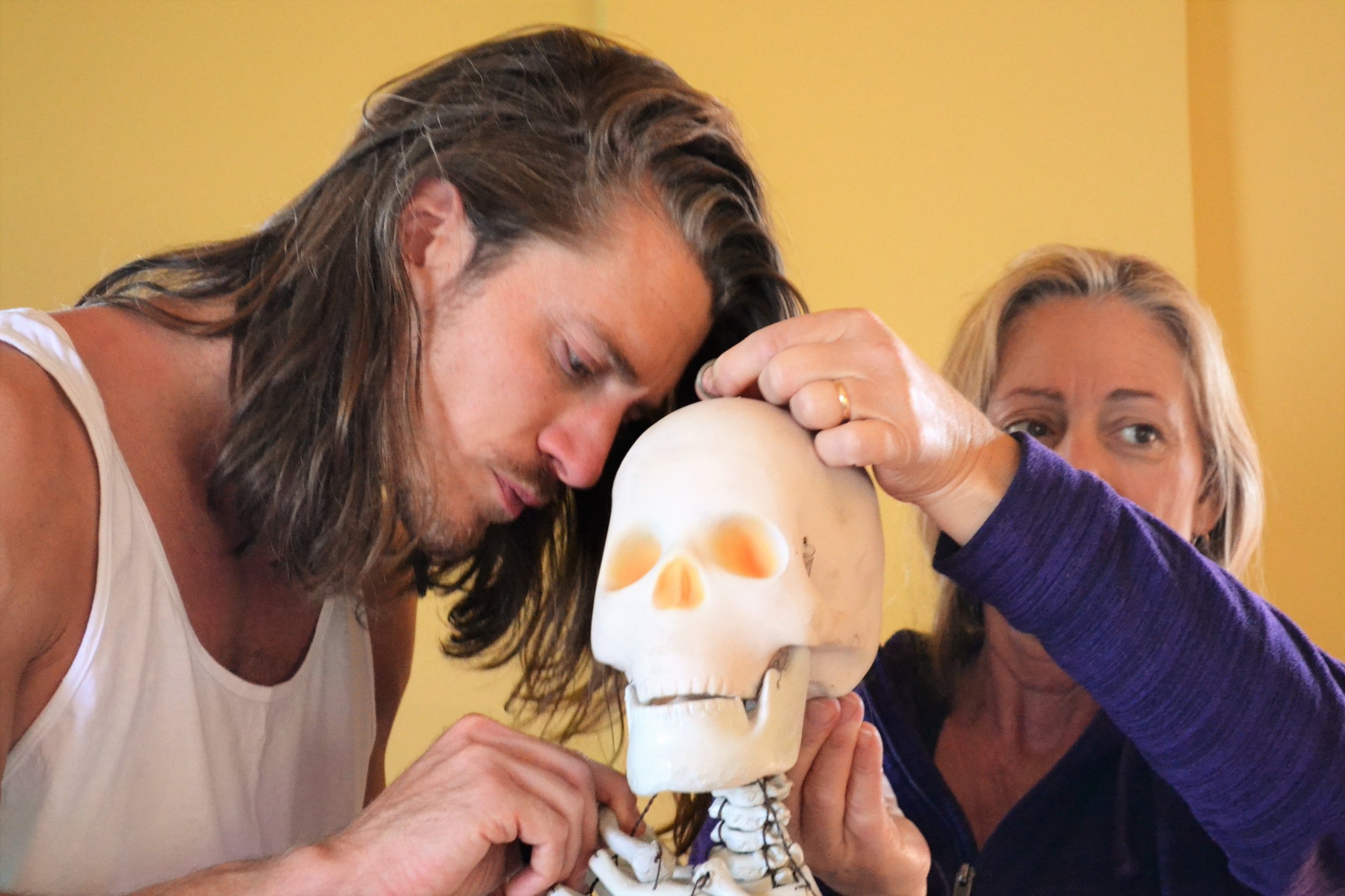 Bonding with the anatomy skeleton, yoga teacher training in Nepal.JPG