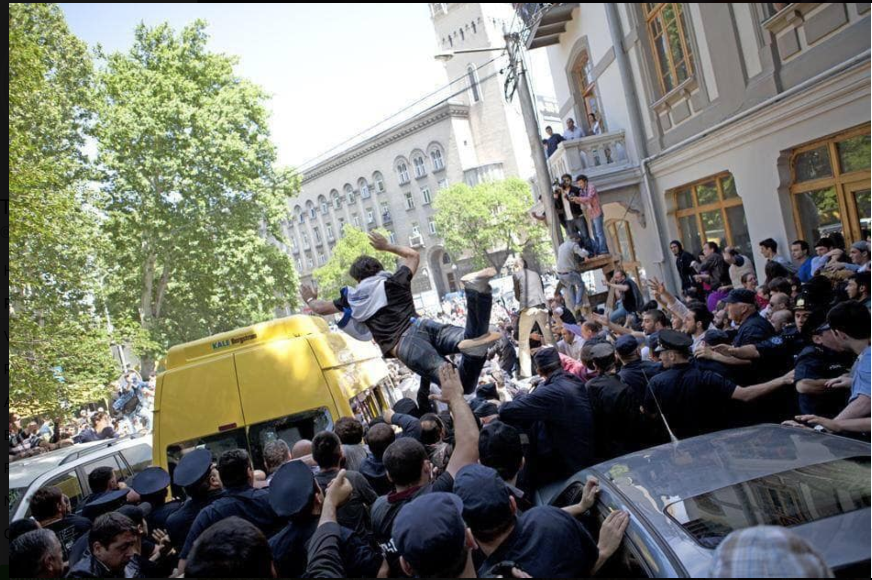 IDAHOT demonstrators are escorted by yellow minibuses, May 17, 2013, Facebook
