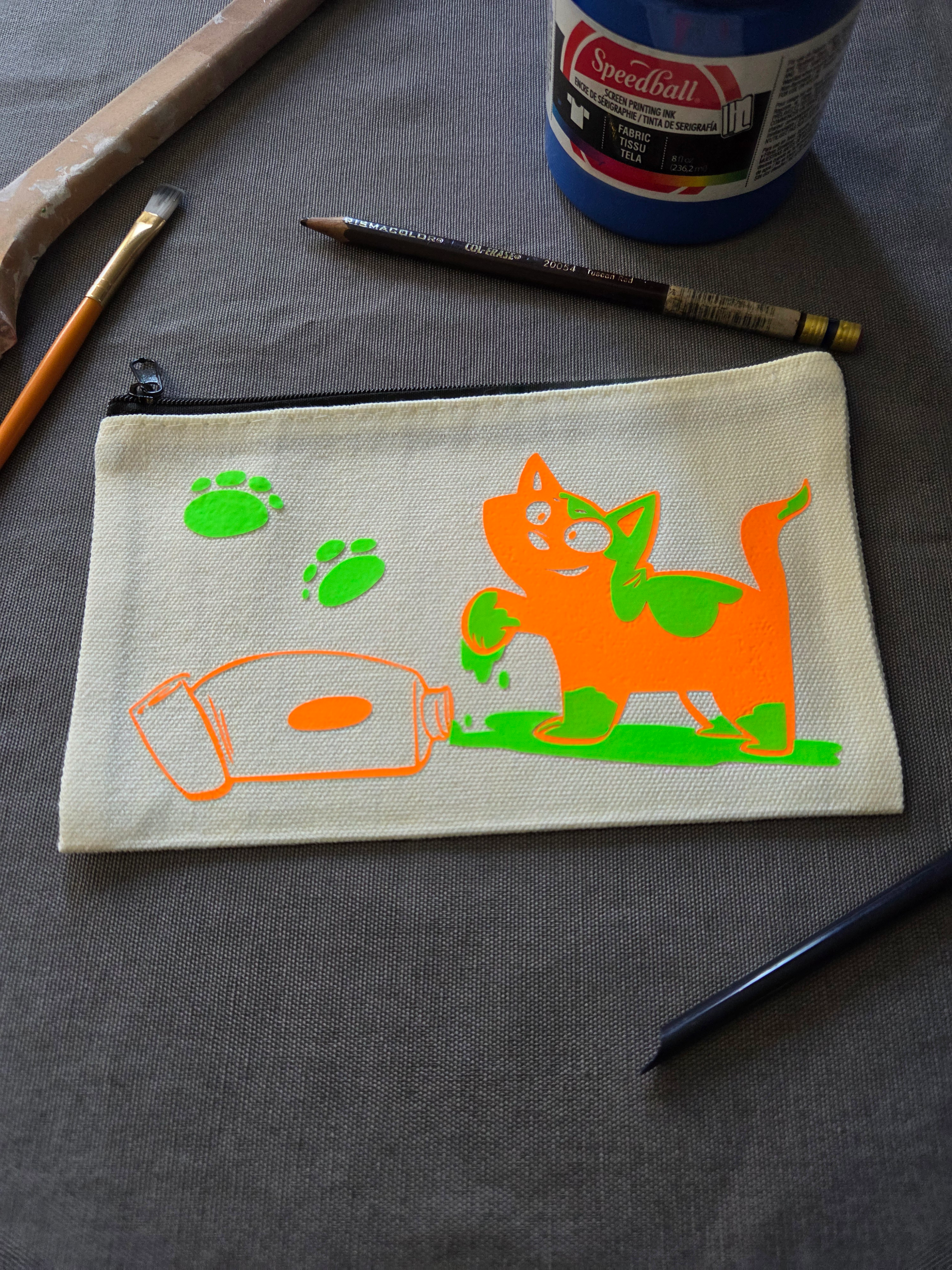 Pencil Pouch_cat_paint_orange-green-glow.png