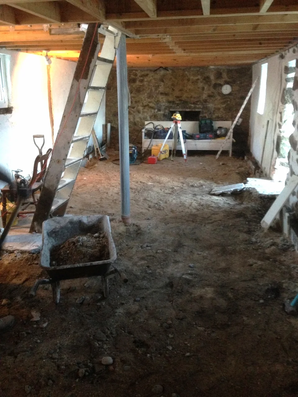  Lowering the internal floor level to accommodate insulation and heating pipes. 