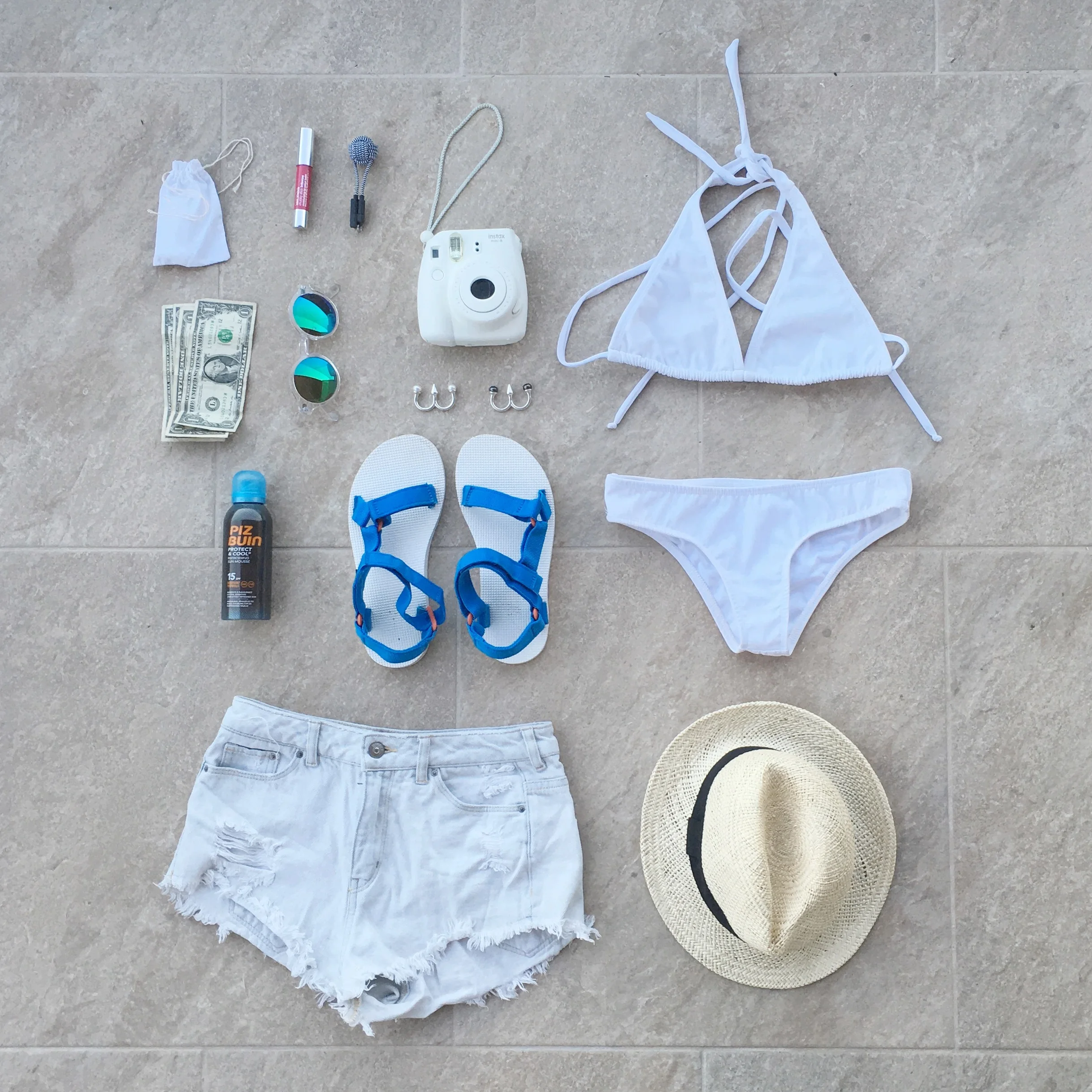Costa Rica Essentials: Clinique Chubby Stick, Antipearle rings, H&M x Coachella sunglasses, Instax, Piz Buin Protect and Cool, Teva sandals, H&M shorts, Morena Beachwear s…