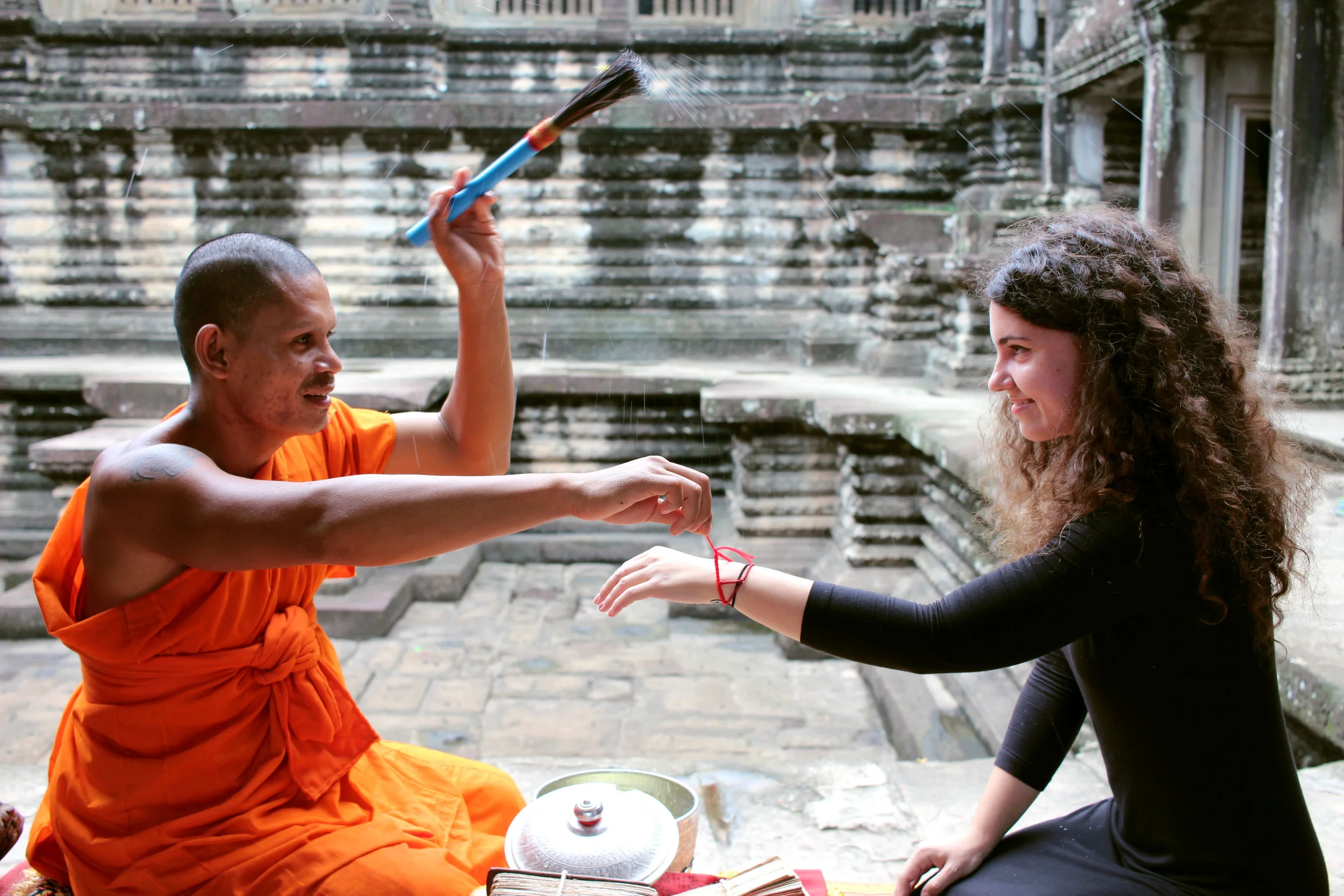 Receiving a monk's blessing in Siem Reap, Cambodia .