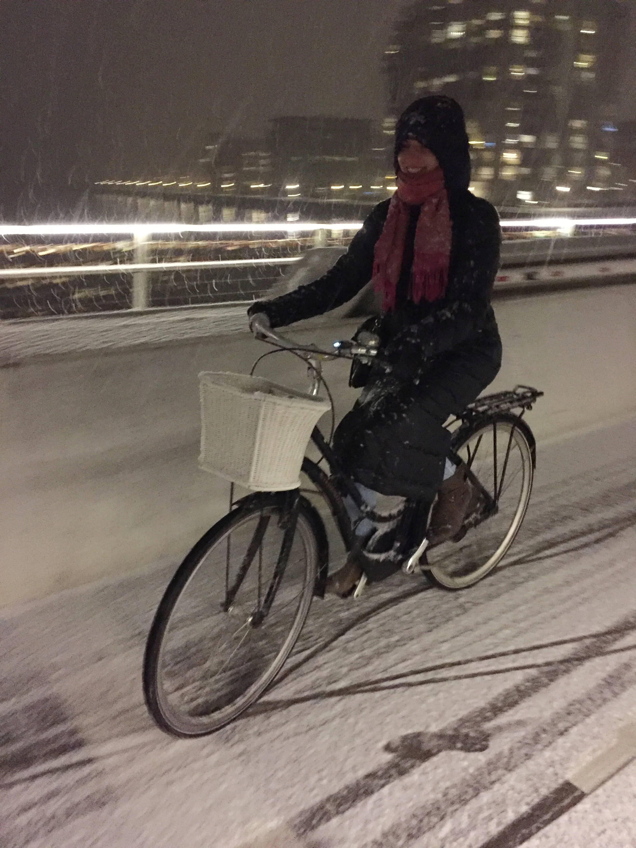Biking in the snow at night with my sleeping bag coat