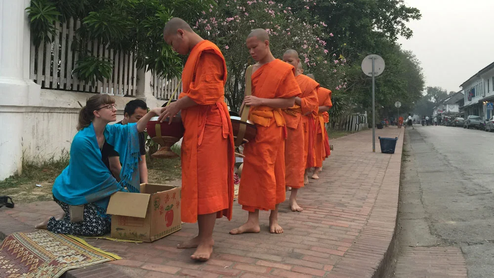Participating by giving out apples