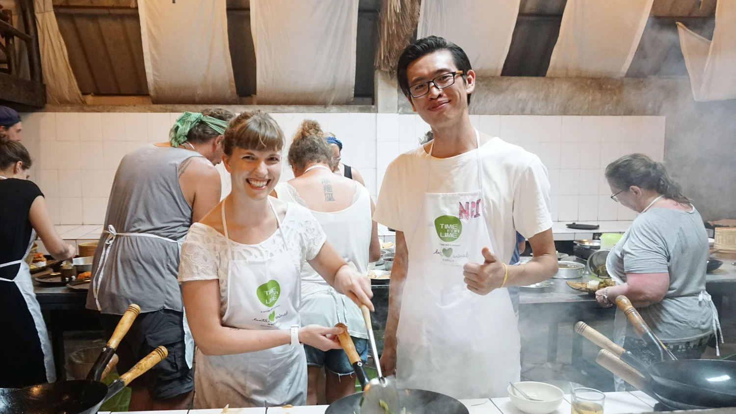 Stir-frying under Noi's guidance 