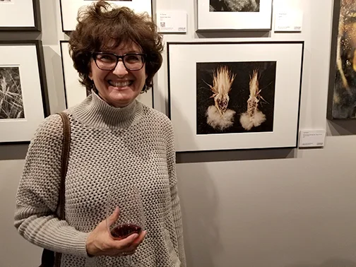 I'm pictured here on opening night with one of the images from my "Halves" series.